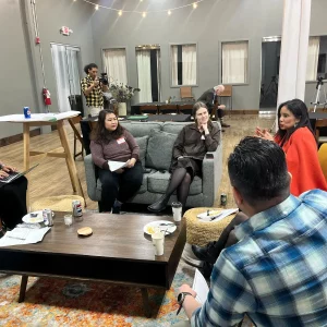 Dialogue Facilitator Farhanna Sayegh engages Great Falls Center dialogue participants in a group conversation about the shared history of Paterson's diverse immigrant communities.